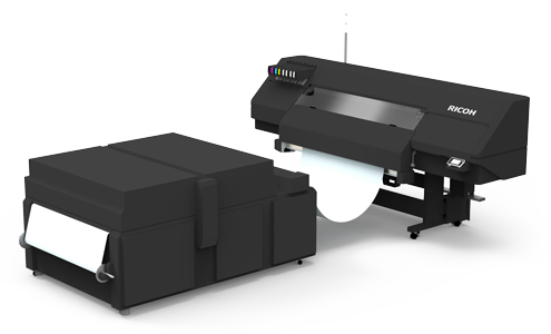 RICOH Pro D1600 with wide print unit, automatic powder shaker and tunnel dryer – modular DTF roll-to-roll system for continuous transfer printing in industrial textile production