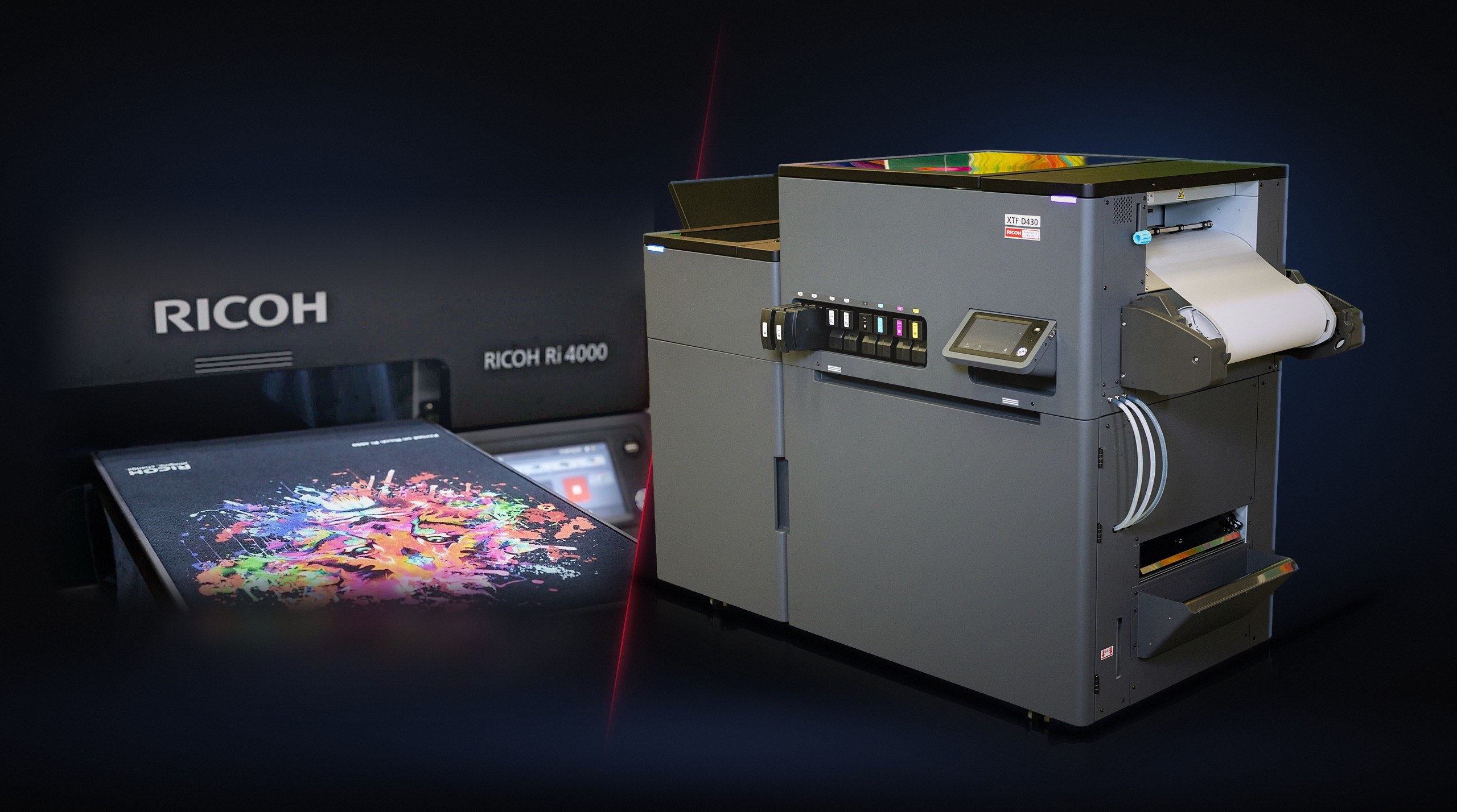 Two industrial printers side by side: a Ricoh Ri 4000 with a printed shirt and a grey XTF D430 transfer printer.